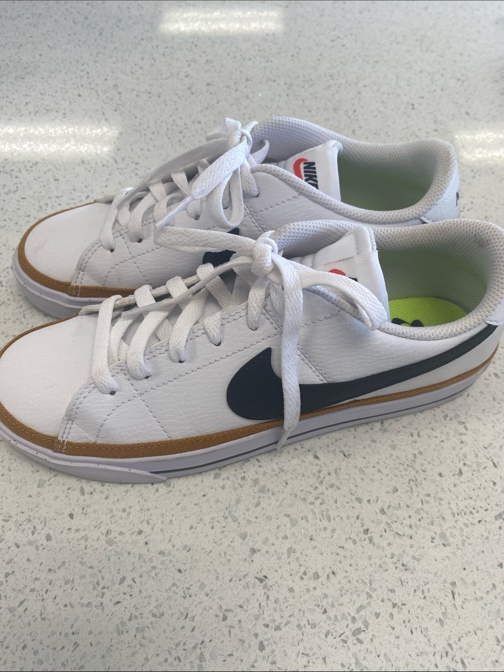 Nike White court Sneakers with Black Swoosh and Brown Trim